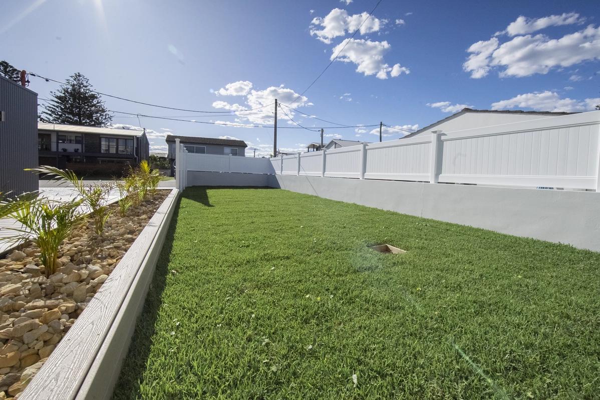 Landscaped yard – The Entrance renovation